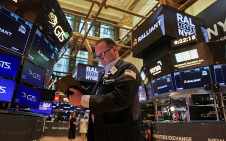 Wall St knocked lower by tariff jitters, Musk's political plan hurts Tesla